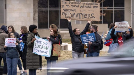 Fired Department of Education employees clean out desks